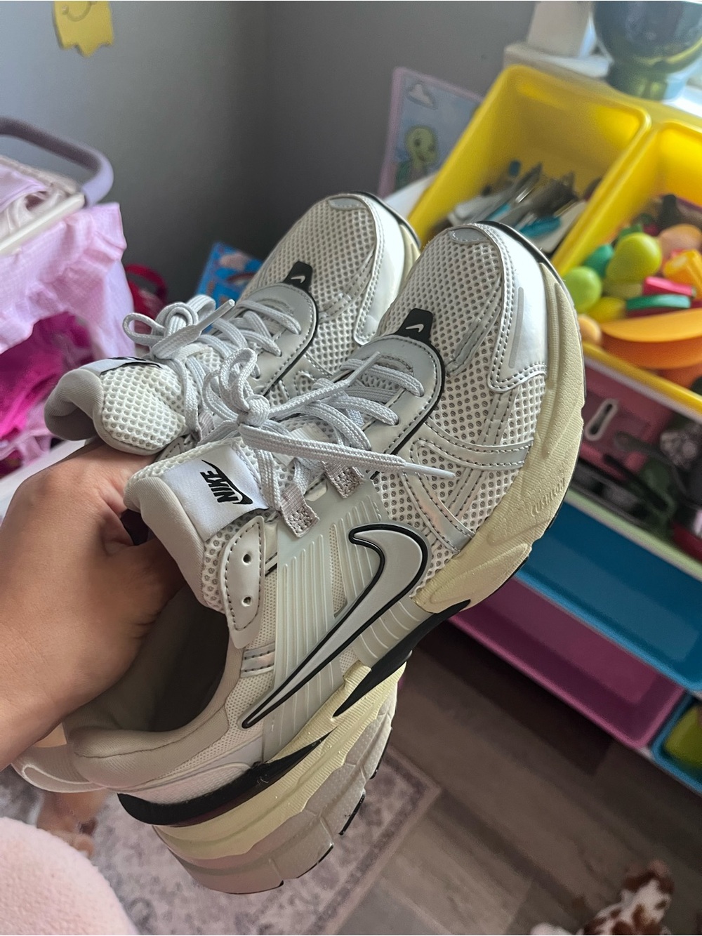 Nike Women's White Sneakers with Black Swoosh
